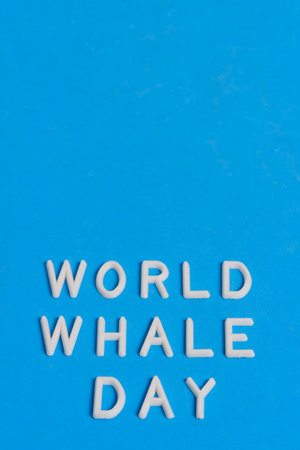 Inscription World Whale Day blue backgroundの写真素材