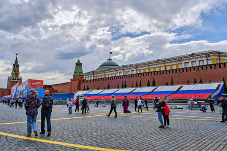 Moscow 10.05.2023.Rostrum colors of Russian flag on Red Square against background red Kremlin wallのeditorial素材