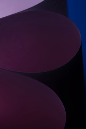 Abstract lilac blue macro background, smooth lines of paper sheets