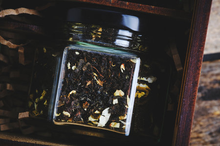 Floral black tea is packed in jarの写真素材