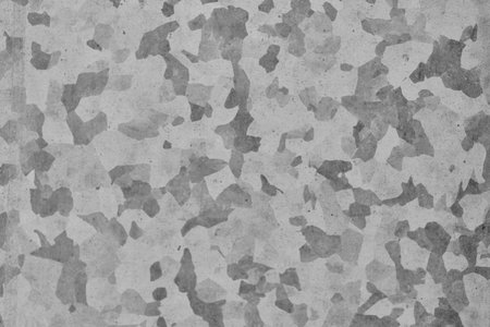 Metallic zinc background. Mottled, camouflage grey textureの写真素材