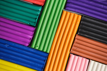 Background made bright multicolored plasticine designed for modeling and creativity