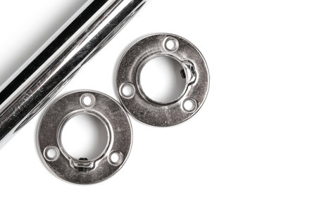 Nickel plated tube and two flanges for its attachment, white backgroundの写真素材