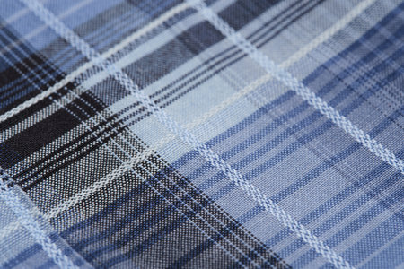 Fabric, texture checkered blue background closeup