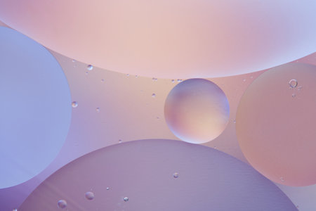 Abstract background with pastel colors with oil circles water surfaceの写真素材
