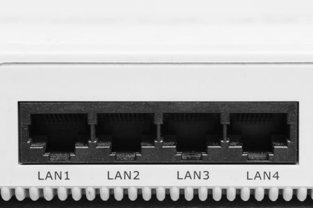 Four lan inputs on the back of the modemの写真素材