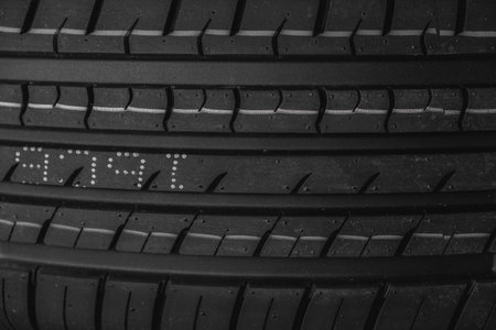 Car tire texture background. Black and white car tyre close up.の写真素材