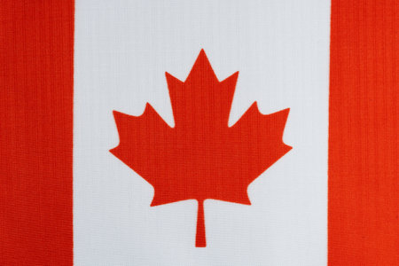 Flag of Canada, made of fabric with the image of a maple leaf