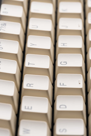 Closeup  retro style keyboard with beige keys.の写真素材