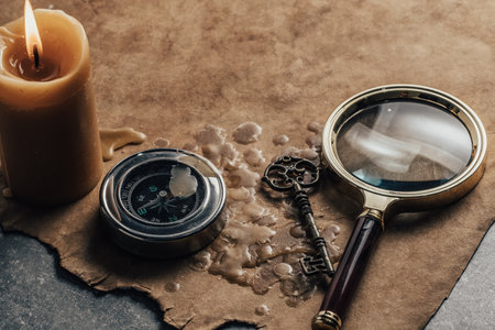 magnifying glass on old paper background with copy space