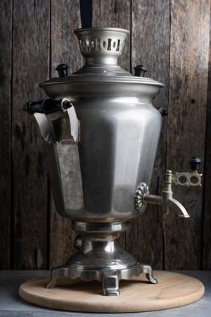 Vintage telephone on old wooden background. Selective focus with shallow depth of field.の写真素材