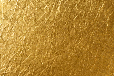 Gold foil texture for background and design. Abstract background and texture for design.