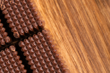 Chocolate candy on wooden background. Top view. Copy space.の写真素材