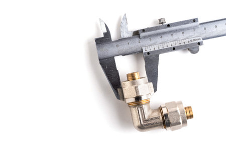 Water valve and vernier caliper isolated on a white background