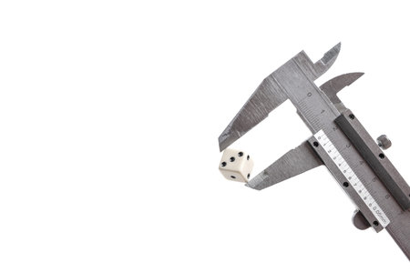 Caliper with vernier and dice, highlighted on a white background.の写真素材
