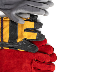 Work gloves on a white background with space for text.の写真素材
