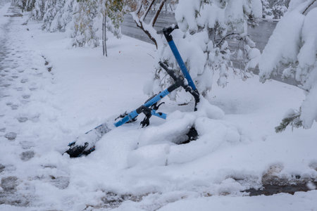 Electric scooters covered with snow.の写真素材