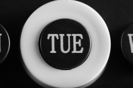 Abbreviated designation day week on calendar in close up, Tuesday.の写真素材