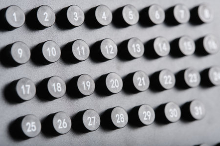 Dates on stylish black calendar.の写真素材