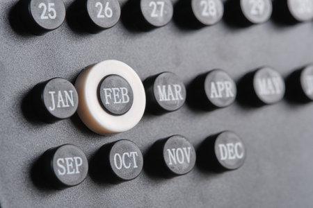 Month February on stylish black calendar, close up.の写真素材