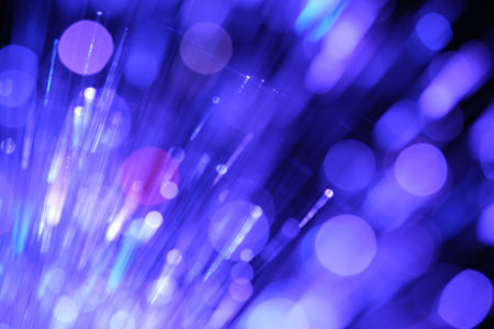fiber optical network cable in blue light abstract macro close-up