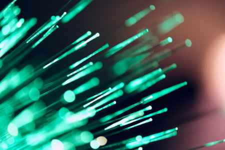 Fiber optical network cable close-up with bokeh background