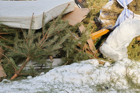 Pile of garbage on the street in winter, closeup of photo