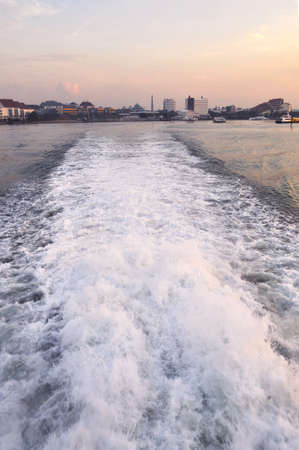 Waves bubbles by the Ferryの写真素材