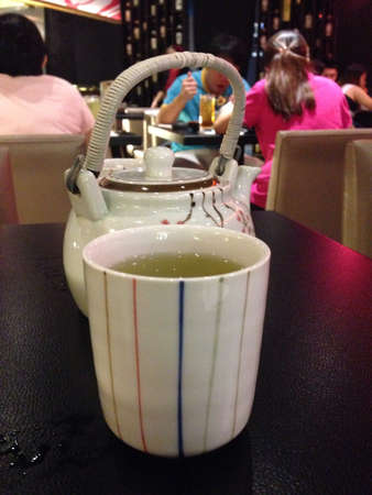Japanese style green tea and tea pot.の素材