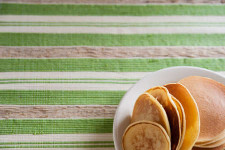 pancakes on a white plate for breakfastの写真素材
