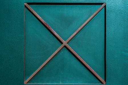 bright metal background with the iron crossの写真素材