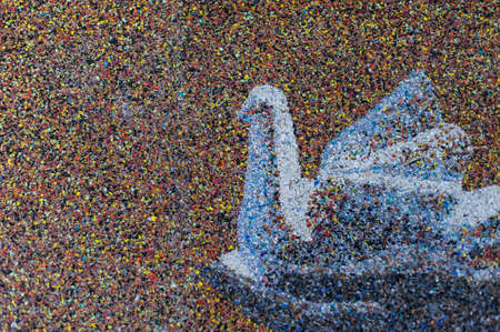 bird in hand background from stone chipsの写真素材