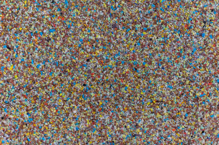 the texture of placer yellow and bright blue small stonesの写真素材