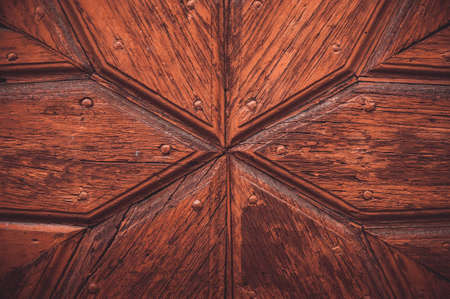 Part decorative old wooden door with textured patternの写真素材