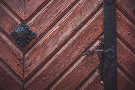 Part decorative old wooden door with textured patternの写真素材