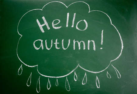 Hello autumn - the inscription on the blackboard with chalkの写真素材