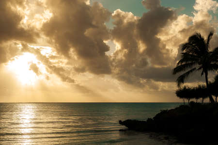 Dawn over the Indian ocean. Sun and sky in the tropics. The Island Of Zanzibar, Tanzaniaの写真素材