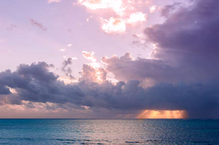 Dawn over the Indian ocean. Sun and sky in the tropics. The Island Of Zanzibar, Tanzaniaの写真素材