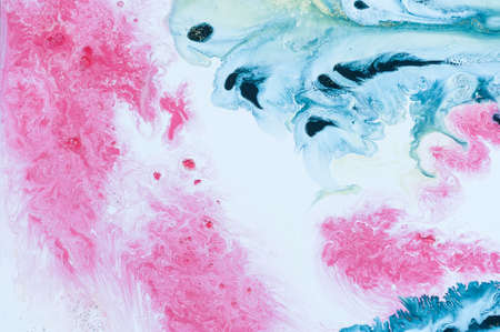 Abstract colorful background. Drawing with acrylic paints on water. Texture play of paint.の写真素材