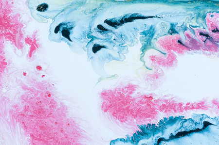 Abstract colorful background. Drawing with acrylic paints on water. Texture play of paint.の写真素材