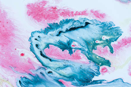Abstract colorful background. Drawing with acrylic paints on water. Texture play of paint.の写真素材