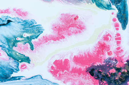 Abstract colorful background. Drawing with acrylic paints on water. Texture play of paint.の写真素材