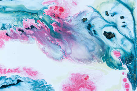 Abstract colorful background. Drawing with acrylic paints on water. Texture play of paint.の写真素材
