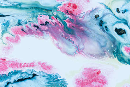 Abstract colorful background. Drawing with acrylic paints on water. Texture play of paint.の写真素材
