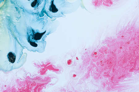Abstract colorful background. Drawing with acrylic paints on water. Texture play of paint.の写真素材