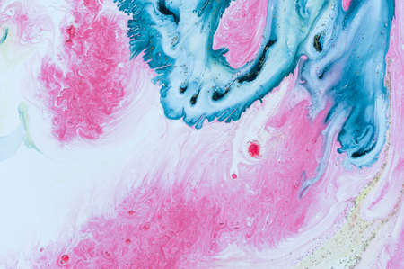 Abstract colorful background. Drawing with acrylic paints on water. Texture play of paint.の写真素材