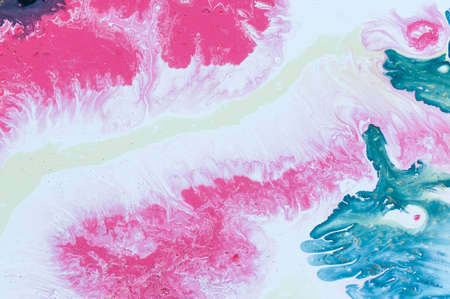 Abstract colorful background. Drawing with acrylic paints on water. Texture play of paint.の写真素材