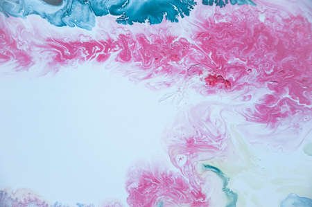 Abstract colorful background. Drawing with acrylic paints on water. Texture play of paint.の写真素材