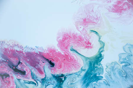 Abstract colorful background. Drawing with acrylic paints on water. Texture play of paint.の写真素材