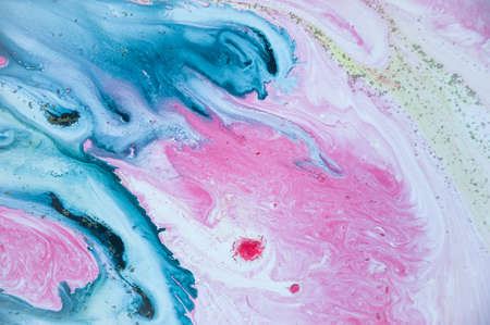 Abstract colorful background. Drawing with acrylic paints on water. Texture play of paint.の写真素材